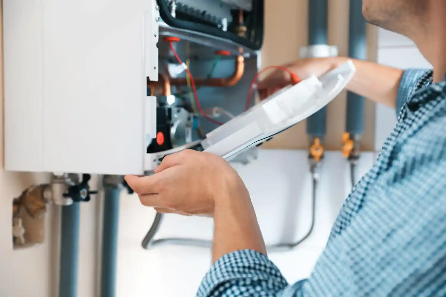 Gas Safe engineer providing boiler installation and repair services in a Stevenage home, ensuring efficient heating, hot water supply, and improved indoor comfort.