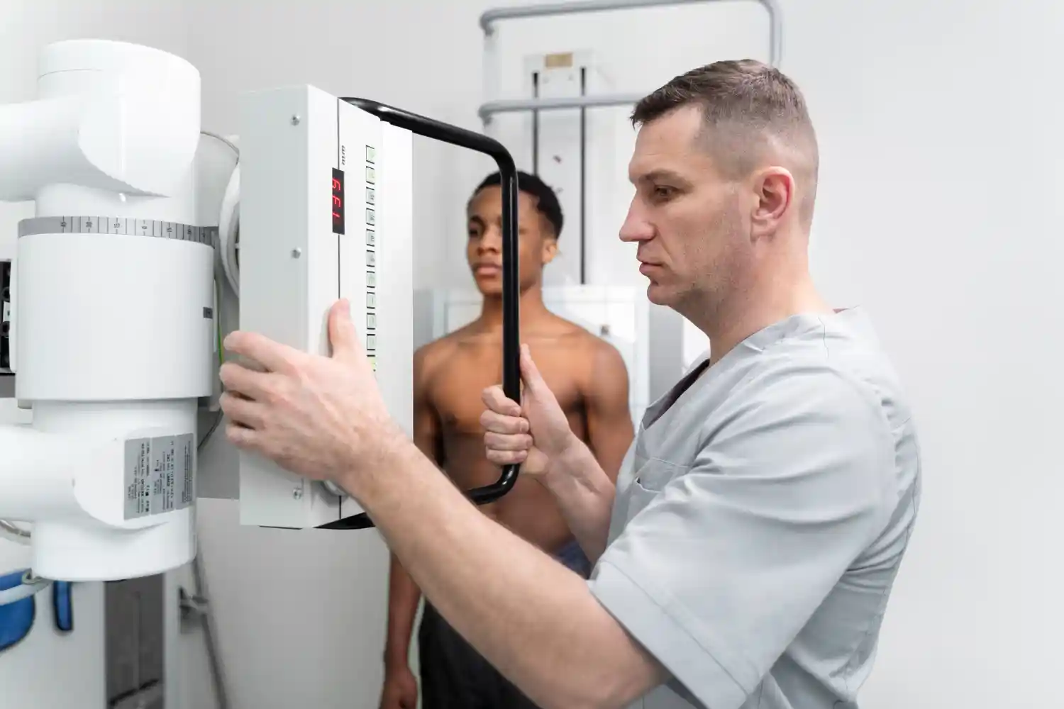 Gas Safe registered boiler engineer inspecting and repairing a residential heating system in a Kensington home during a professional maintenance service.